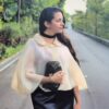 Waves and Wild Storybook Cape sheer cape with clutch bag