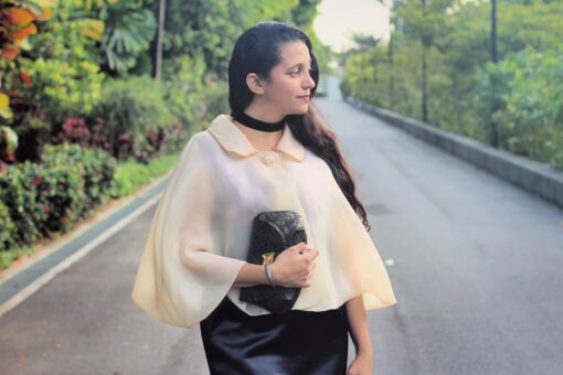 Waves and Wild Storybook Cape sheer cape with clutch bag