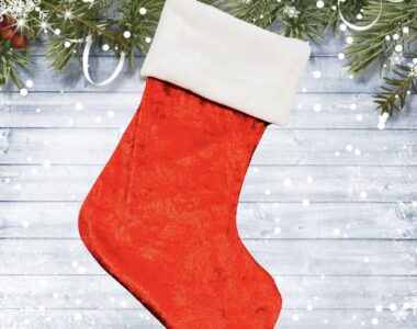 Red Christmas stocking with white trim